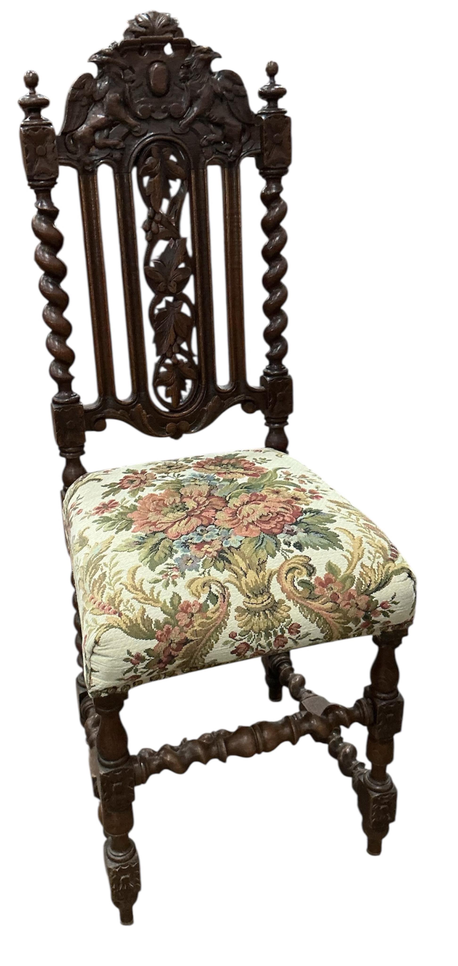 A set of six Victorian carved oak dining chairs, width 38cm, depth 40cm, height 114cm